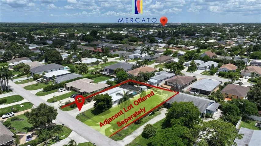 Aerial overview of a residential neighborhood with single-story homes