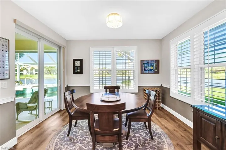 Dining room featuring hardwood / wood-style floors and plenty of natural light