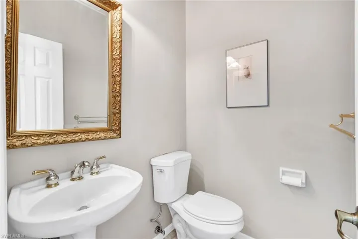 Bathroom featuring toilet and sink