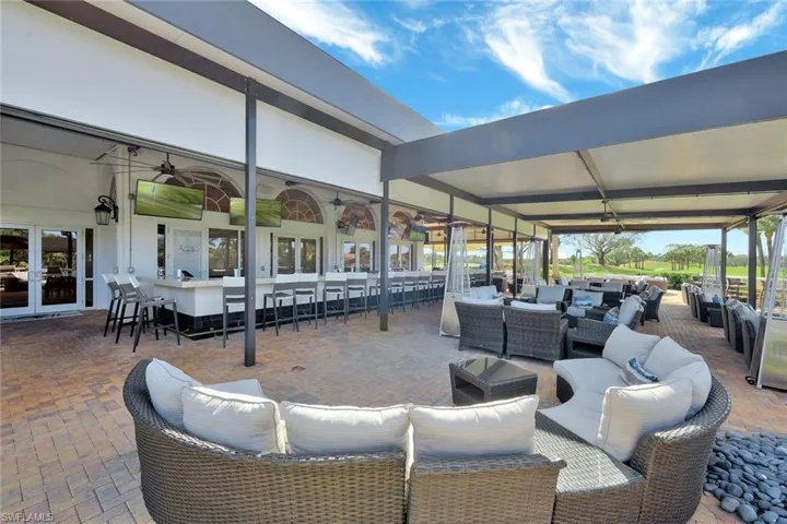 View of patio / terrace featuring exterior bar