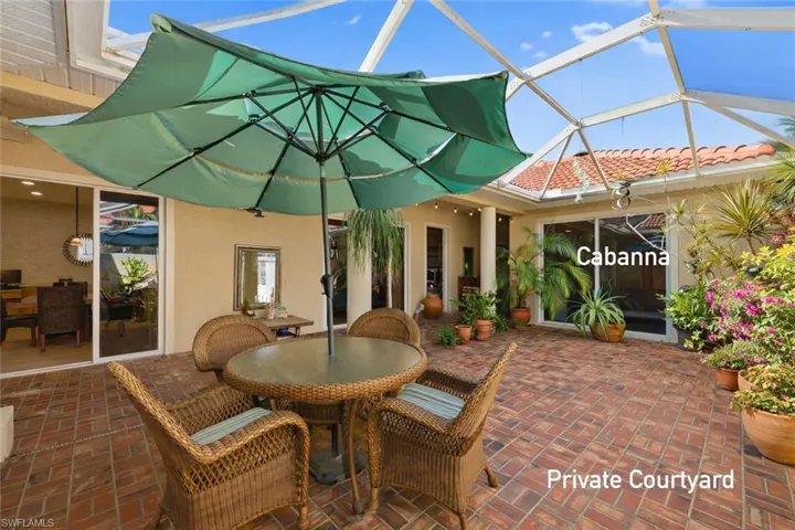 Paved private courtyard with cabanna apartment