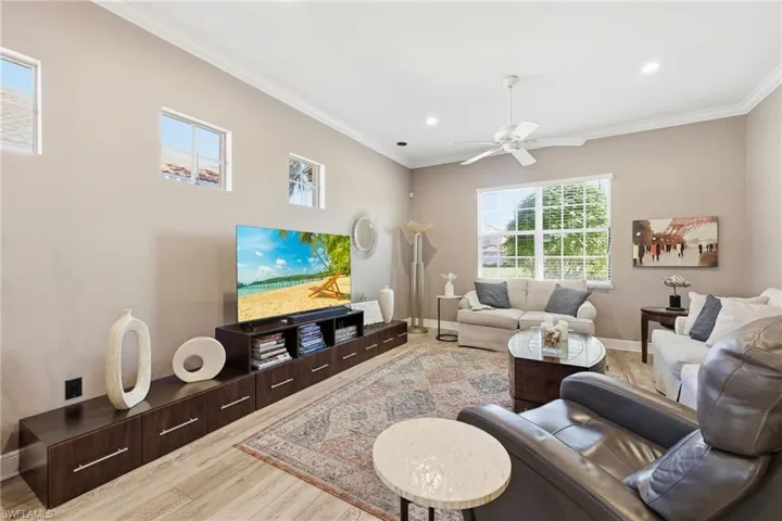 Living room with courtyard and canal views