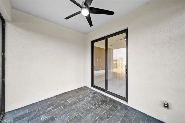 Spare room featuring ceiling fan