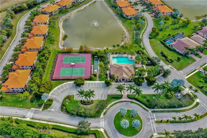 Aerial overview of property's location with a nearby body of water and nearby suburban area
