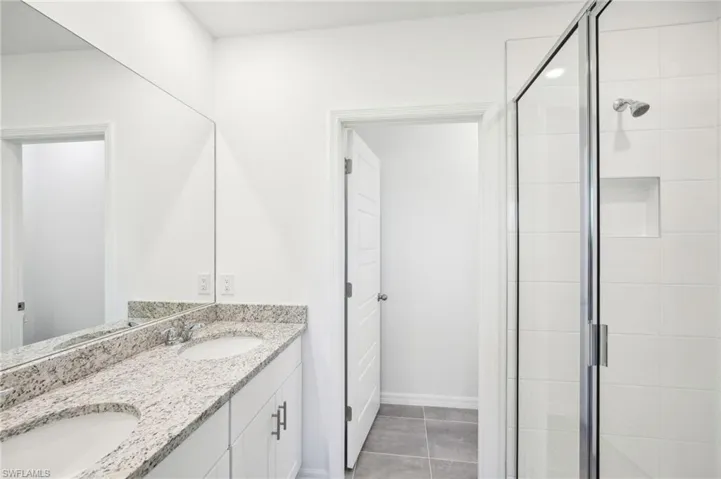 Photos are of a model home with the same floorplan; actual home may have a different features or layout orientation.