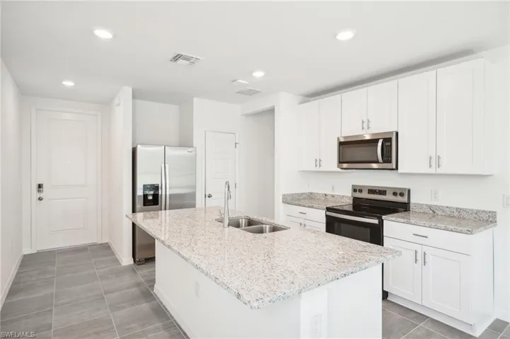 Photos are of a model home with the same floorplan; actual home may have a different features or layout orientation.
