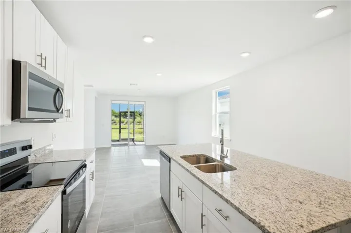Photos are of a model home with the same floorplan; actual home may have a different features or layout orientation.