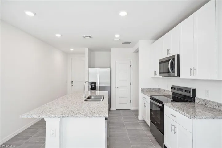 Photos are of a model home with the same floorplan; actual home may have a different features or layout orientation.