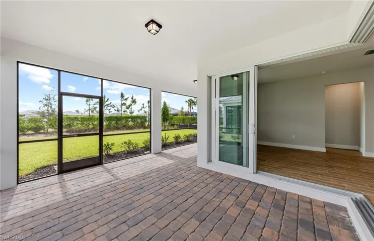 Unfurnished sunroom with a healthy amount of sunlight
