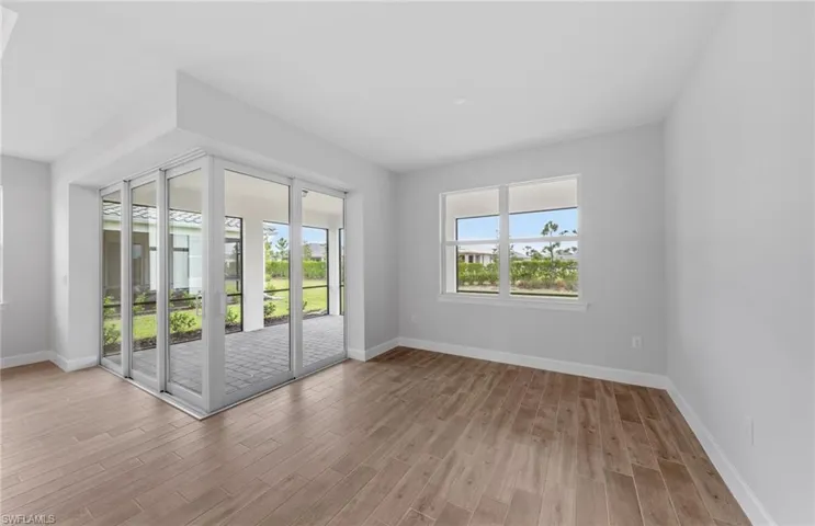Spare room featuring light hardwood / wood-style flooring