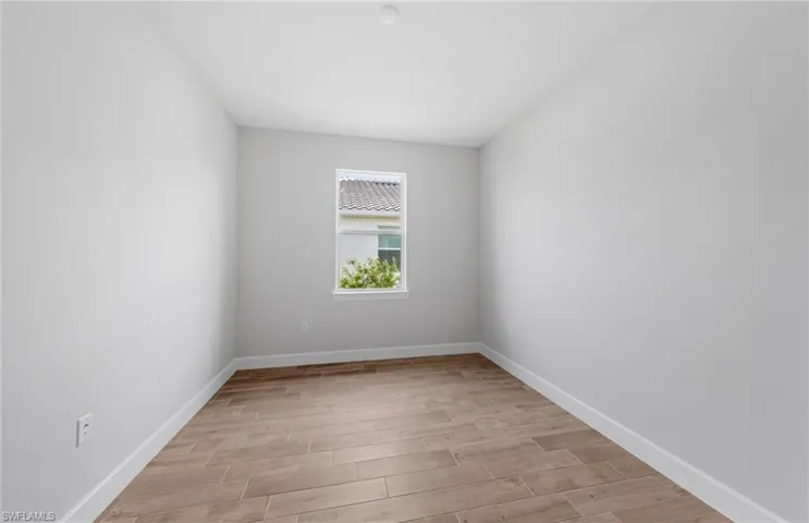 Spare room featuring light hardwood / wood-style floors