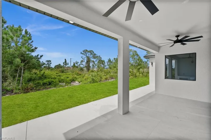 View of patio with ceiling fan
