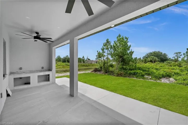 View of patio / terrace with ceiling fan