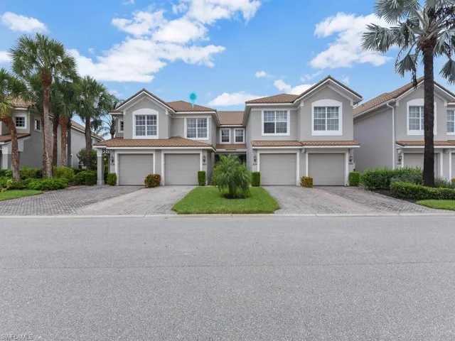Attached Extended Garage & Pavers On Driveway