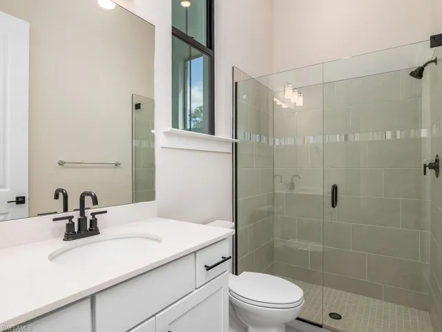 Ensuite/Pool bath includes upgraded walk-in shower.