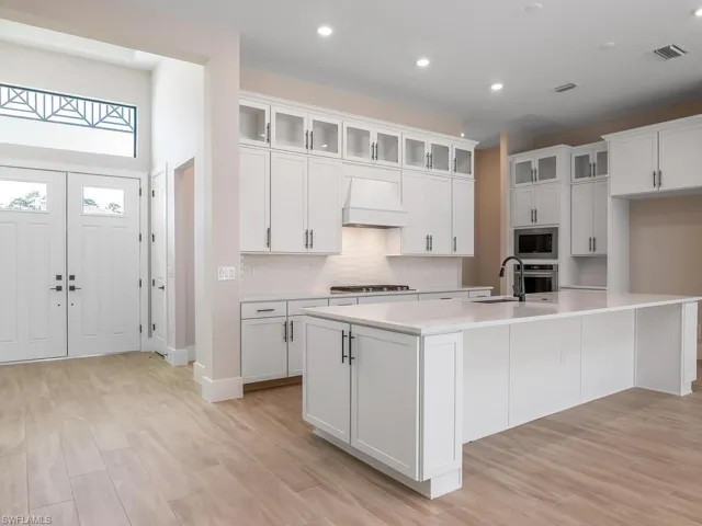 Inviting entry foyer leads to open kitchen/great room.