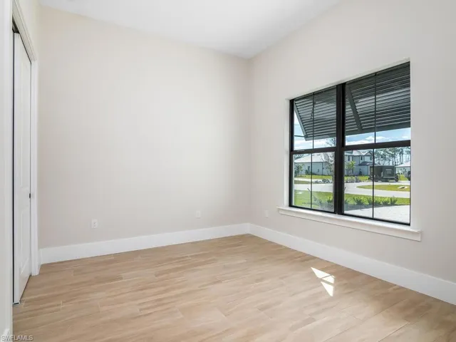 Flex Room at front of the home is the perfect office space or can be used as a fourth bedroom as it does include a closet.