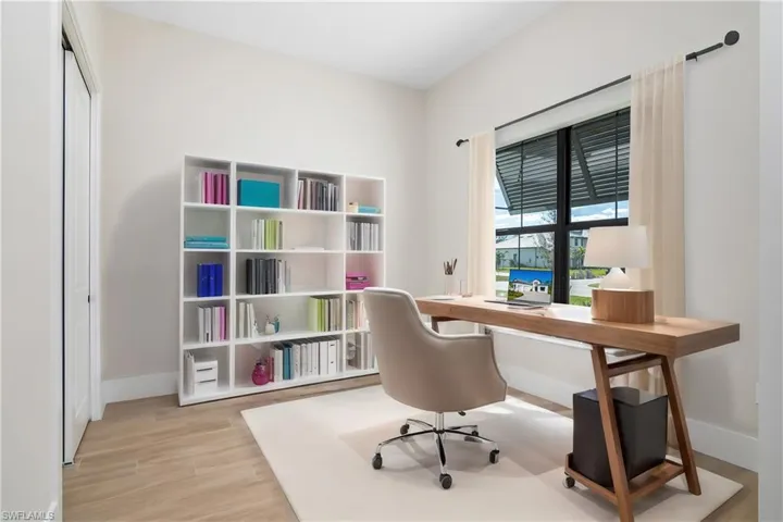 Den/Flex Room just off entryway. (furnishings digitally staged)