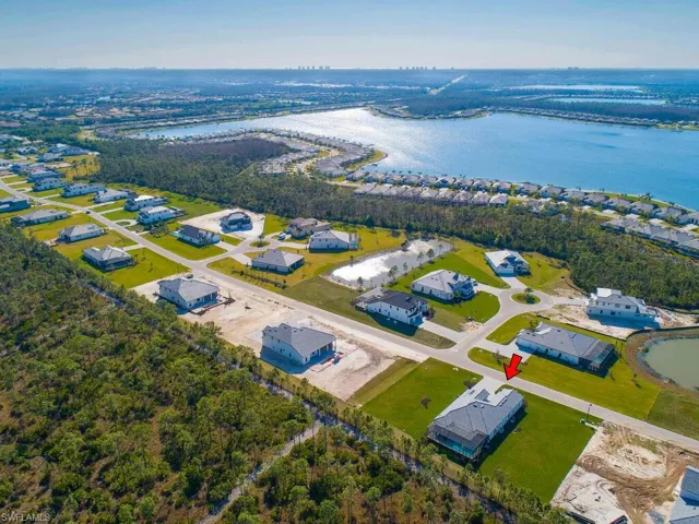 Note the difference between this home lot size and the nearby community to the east... With nearly 1 acre of land you'll have plenty of room between neighbors and lots of privacy, while still located within a gated community for added security.
