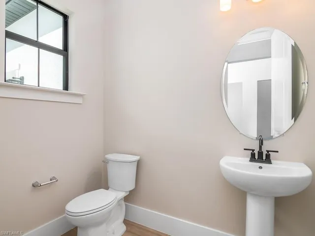 Powder room at the front of the home.
