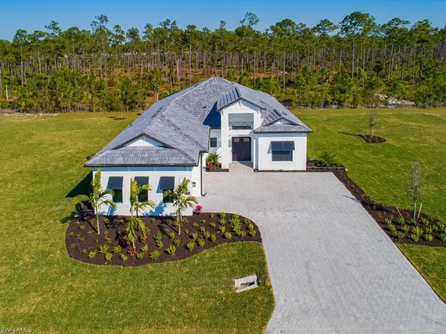 Welcome to this GORGEOUS home in Corkscrew Estates! Enjoy this BRAND NEW home situation on nearly 1 acre of land, with NO CDD, and LOW HOA fees!