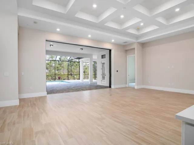 Pocket sliding doors lead to huge covered outdoor living space.