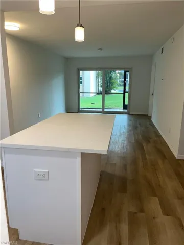 Spare room with wood finished floors