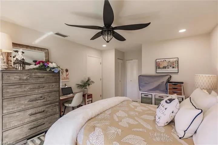 Sitting room featuring light wood finished floors, a ceiling fan, baseboards, recessed lighting, and visible vents