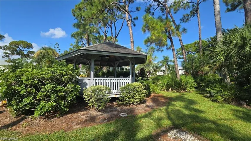 Pool with fence and a patio area