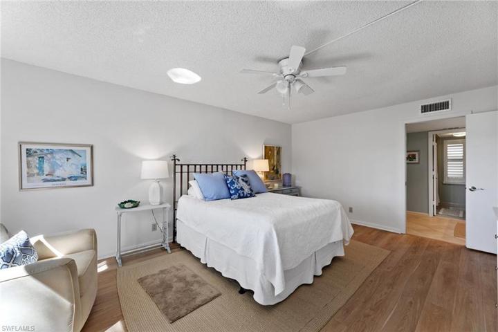 Spacious Master Bedroom with warm comfortable beach inspired feeling!