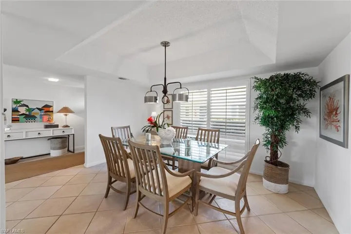 Dining room continues the warm beachy vibe!