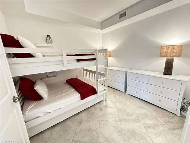 Bedroom featuring light tile patterned floors