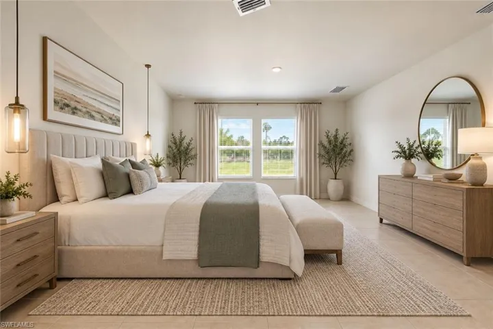 Neutral-toned space featuring large dual-pane windows, recessed lighting, and tile flooring