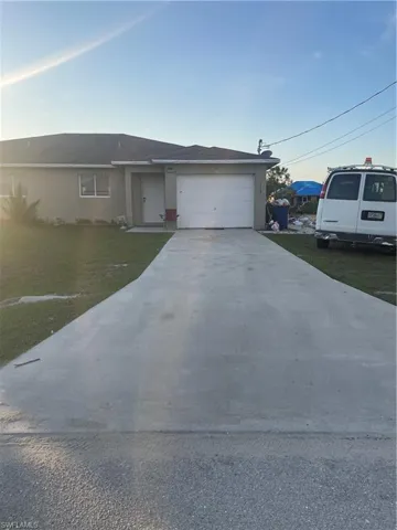 Both side has a big drive way.