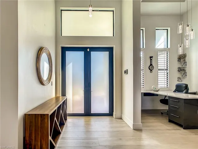 Entryway featuring light wood-style flooring and baseboards