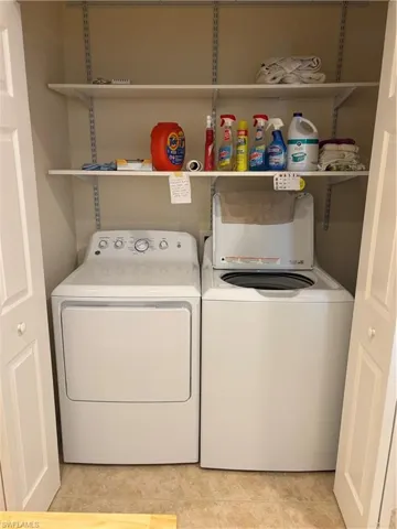 Clothes washing area with washer and dryer
