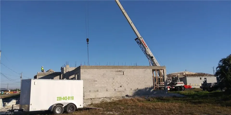 View of home's exterior featuring concrete block siding