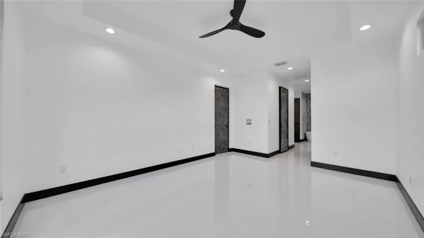 Unfurnished room with recessed lighting and a ceiling fan