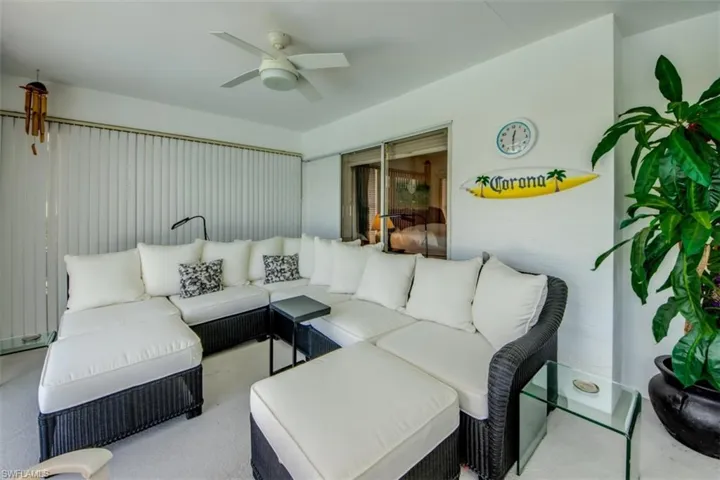 Living area featuring ceiling fan