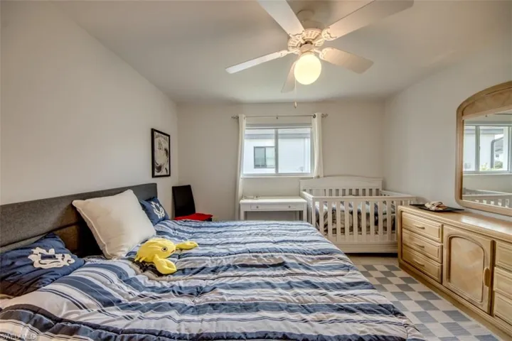 Bedroom featuring a ceiling fan