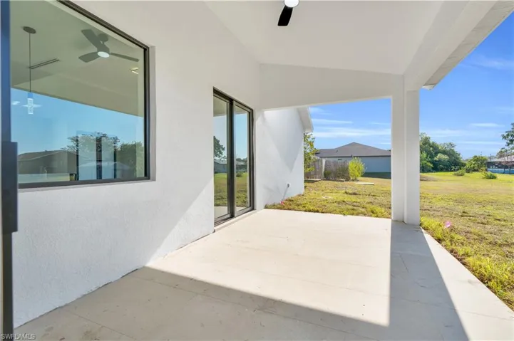 View of patio / terrace with a ceiling fan