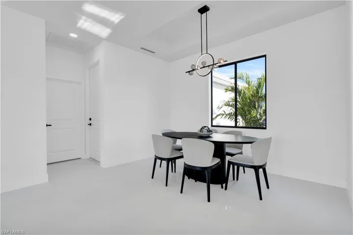 Dining room featuring recessed lighting, visible vents, baseboards, and an inviting chandelier