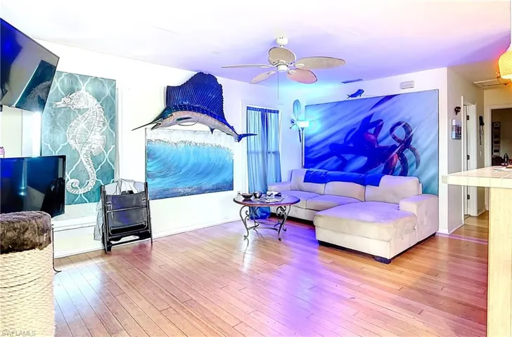 Living room featuring hardwood / wood-style flooring