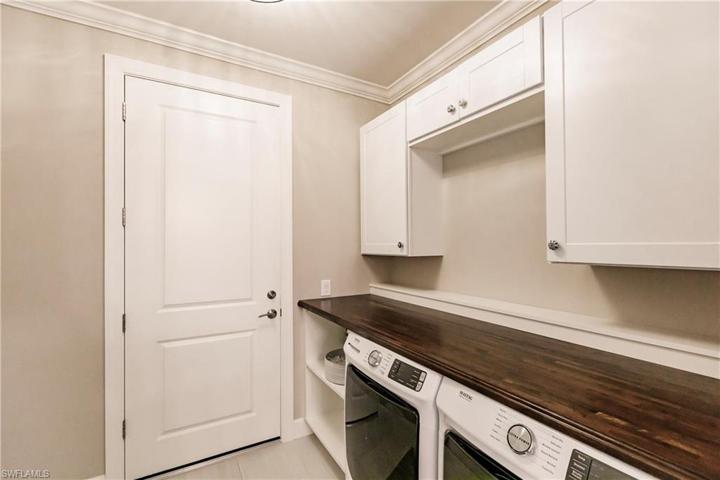 Laundry Room w/Built-In Shelving & Cabinetry