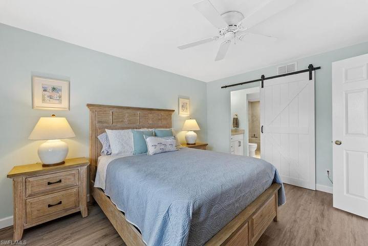 Note the barn door that leads to the luxurious on suite bathroom and large walkin closet.