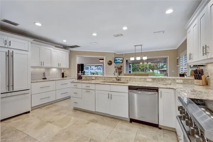 Kitchen features high-end appliances including a Viking induction range!