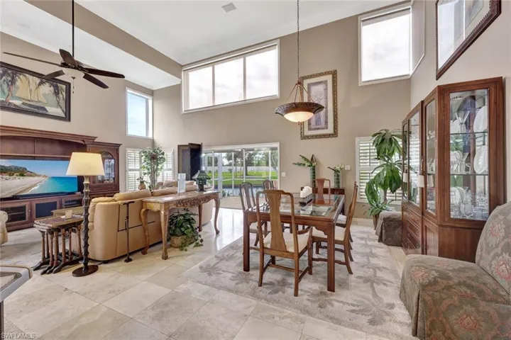 SO MANY EXTRAS THROUGHOUT include Plantation shutters inside and storm shutters outside, crown molding, CAT-5 pre-wiring, and 3M window film that provides energy savings & storm protection.