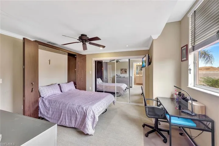 Additional upstairs bedroom features a Murphy bed and its own bathroom.