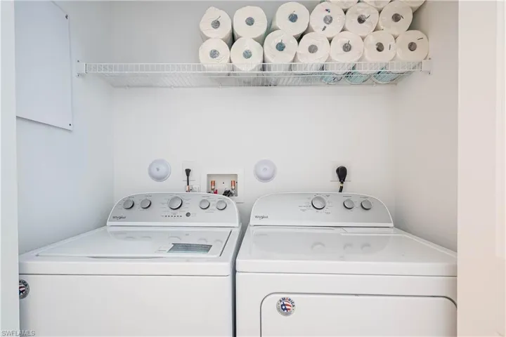 Laundry area featuring independent washer and dryer