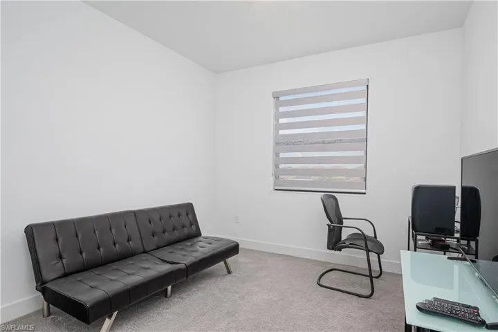 Office area with carpet flooring